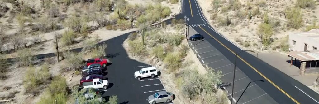 Aerial view of newly paved parking lot and connecting roadway at South Mountain Park in Phoenix, Arizona by Valor Paving