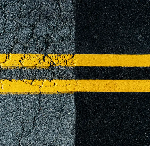Comparison of cracked asphalt versus freshly paved asphalt surface in Arizona
