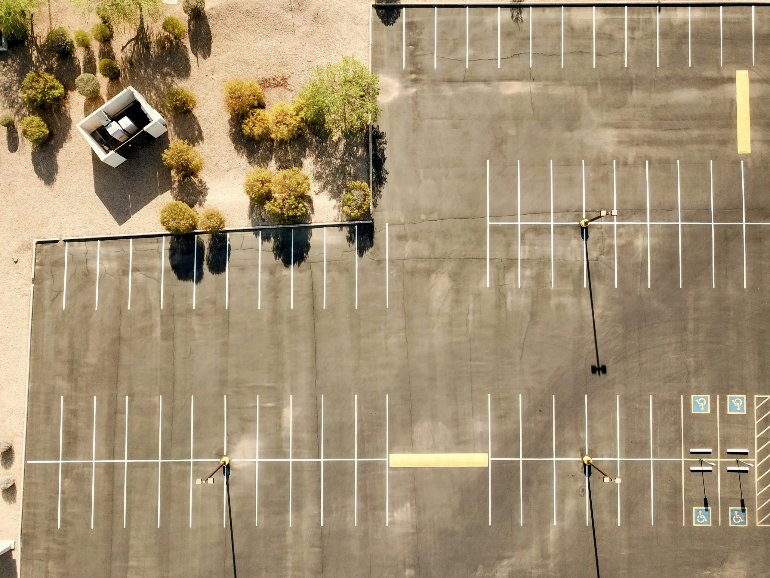 Birdseye view of a parking lot mid-afternoon in Arizona