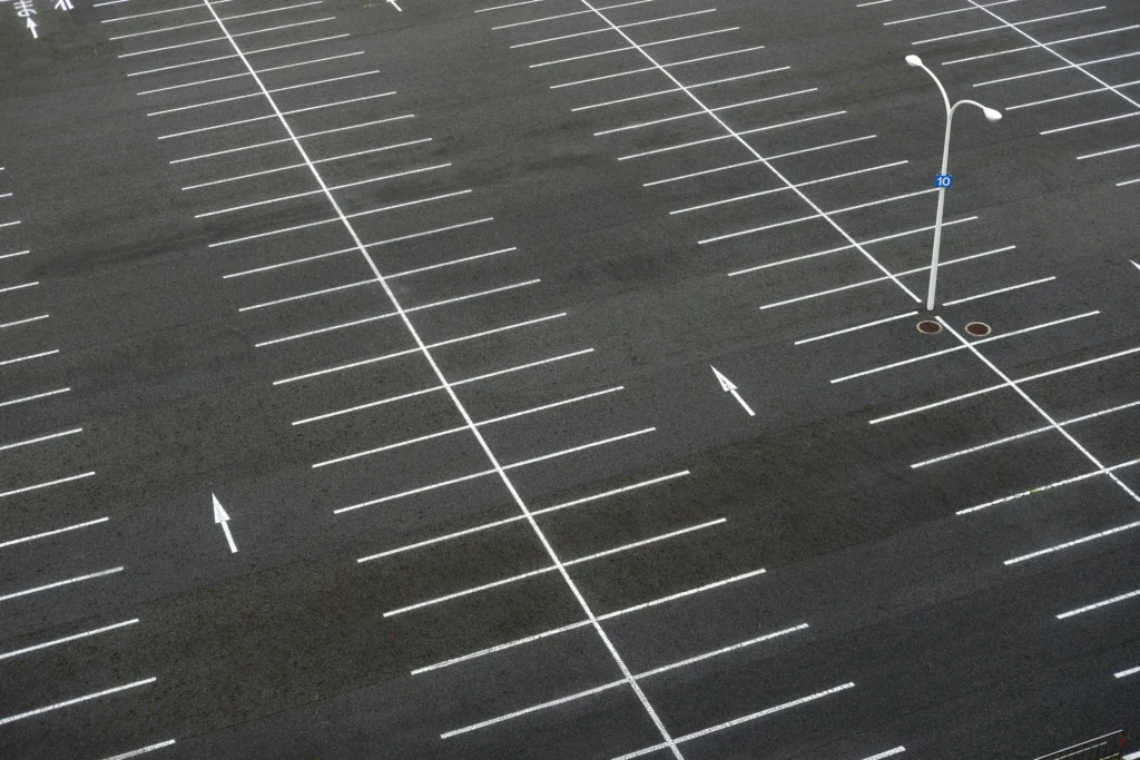 Five common parking lot repair signs on a Phoenix commercial parking lot